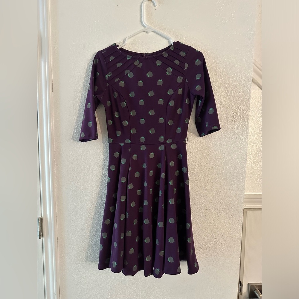 Dark purple dress with grey bubbling cauldron’s